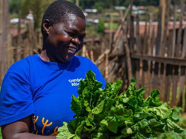 Regina Community Health Worker Dandelion Africa in garden